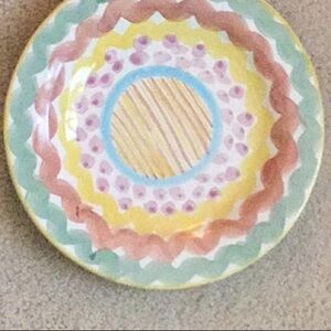 Retired Mackenzie Childs dinner plate.